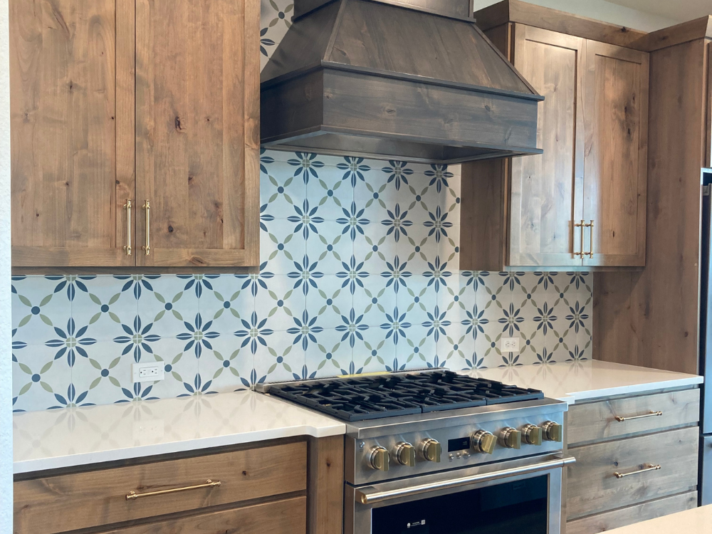 White and blue tile backsplash